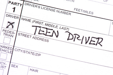 A close up collision report with the words "Teen Driver" on it. 