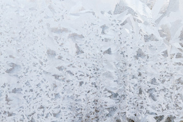 Frosty patterns on a frozen ice box in the early morning