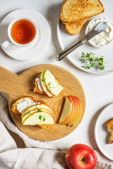 Toasted whole wheat bread with apple, ricotta (cream cheese)