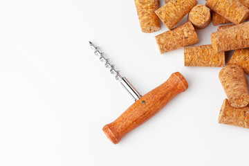 corkscrew and wine cork isolated on white background
