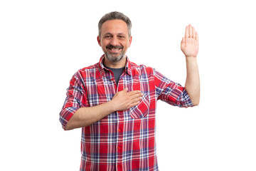 Man making oath gesture