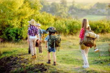 Obraz premium Boys and girls, go hiking with friends.