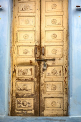 Lock on an old wooden door in India