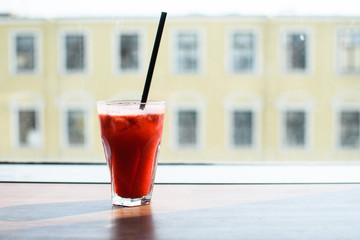 Fresh wild berry lemonade of red color.