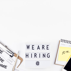 We are hiring flat lay on white background