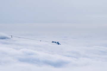 cableway in the sea of clouds