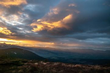 Stormy sky at sunset in the mountains