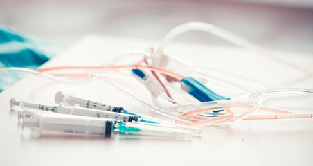 Medical background with  syringe and vaccine bottles