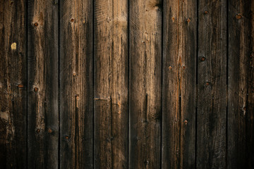 Dark yellow and gray shabby wood background. Old wall wooden vintage floor. Texture backdrop. Rough structure. Black yellow pattern of wooden board. Dark wood texture, weathered, rustic oak.