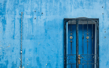 vintage blue door and wall facade view