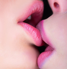 Closeup of pair women mouths kissing. Sexy lips. Sensual tongue, female mouth. Two girls. Lesbian love concept. Hot female. Gentle kiss for a girl. Together forever. Sexy couple.