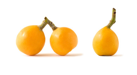 Set of whole loquat or medlar yellow fruits isolated on white background
