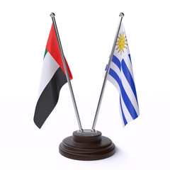 UAE and Uruguay, two table flags isolated on white background. 3d image