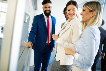 Creative business people working on business project in office