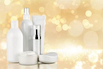 Cosmetic containers isolated on background