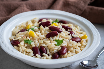 Rice with red beans in bowl .