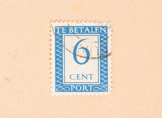 THE NETHERLANDS 1950: A stamp printed in the Netherlands shows it's value, circa 1950