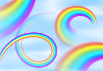 Rainbow in the blue sky among the light clouds