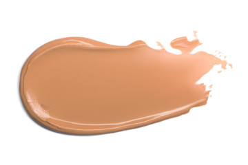 Foundation for face isolated on white. Smear of tonal cream