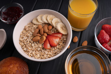 Organic breakfast. Fruit oatmeal. Fresh food. Dessert. Sweet snack. Morning. Diet. Muesli. Granola