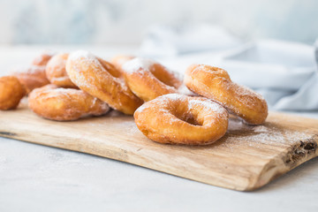 Glazed caramel doughnuts. A close up of fresh glazed doughnuts in a studio setting. donut