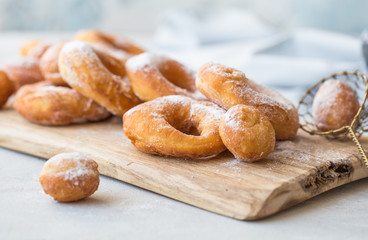Glazed caramel doughnuts. A close up of fresh glazed doughnuts in a studio setting. donut
