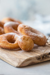 Glazed caramel doughnuts. A close up of fresh glazed doughnuts in a studio setting. donut