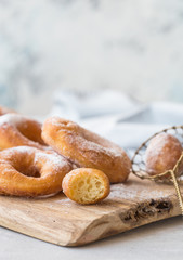 Glazed caramel doughnuts. A close up of fresh glazed doughnuts in a studio setting. donut