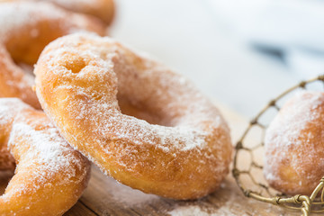 Glazed caramel doughnuts. A close up of fresh glazed doughnuts in a studio setting. donut