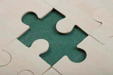 Creative solution for idea - business concept, jigsaw puzzle on the blackboard