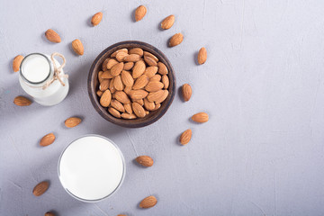 Almond milk on wooden table