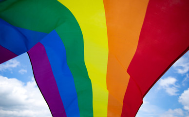 Colorful LGBT flag blows in the breez.