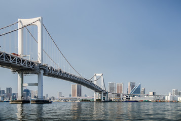 Rainbow Bridge is a bridge on Tokyo Bay between Shibaura Pier and the Odaiba waterfront. Tokyo, Japan.