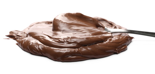 Cream chocolate spread with metal spoon isolated on white background
