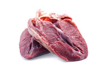 raw pig heart close-up isolated on white background