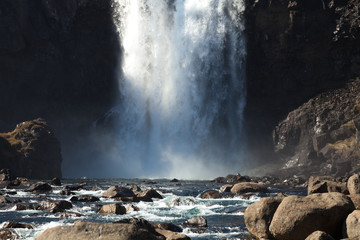 Famous Iceland waterfalls with a clean water on a stony rocky mountain landscape