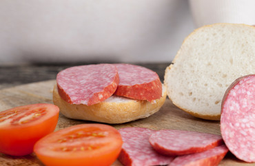 sliced sausage and tomatoes