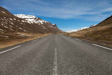 Asphalt road in the fjords of Iceland