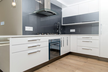 Fototapeta premium Grey white modern kitchen