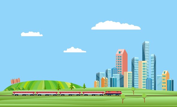 Urban and countryside landscape  with city buildings, train on the railroad . Family houses in town and clouds in the sky green hills in background. 