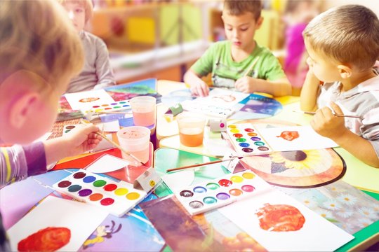 Many preschool children Painting in class room