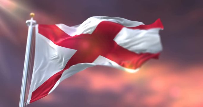 Flag of Alabama state, region of the United States, waving at sunset - loop