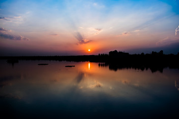 Obraz premium sunset over lake