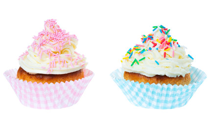 two cupcakes with whipped cream decorated sprinkles isolated on white background