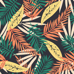 Colorful seamless pattern with tropical leaves on dark background. Vector design. Jungle print. Floral background.