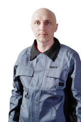 Man in working clothes. Portrait of a middle-aged man, European appearance, in a working overalls. Isolated on white background