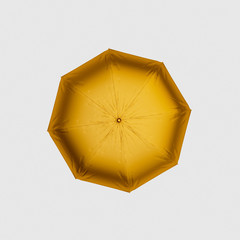 Flying golden umbrella isolated on white background. 3D rendering model illustration © Vitte Yevhen