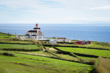Fototapeta na wymiar A beautiful landscape with lighthouse from the Sao Miguel island of Azores in Portugal