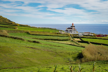 Fototapeta na wymiar A beautiful landscape with lighthouse from the Sao Miguel island of Azores in Portugal
