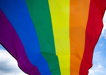 Colorful LGBT flag blows in the breez.